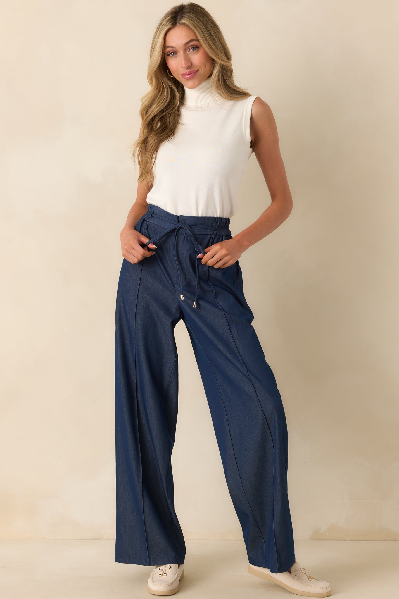 Front full body shot highlighting the elastic waist insert and optional self-tie belt detail.
