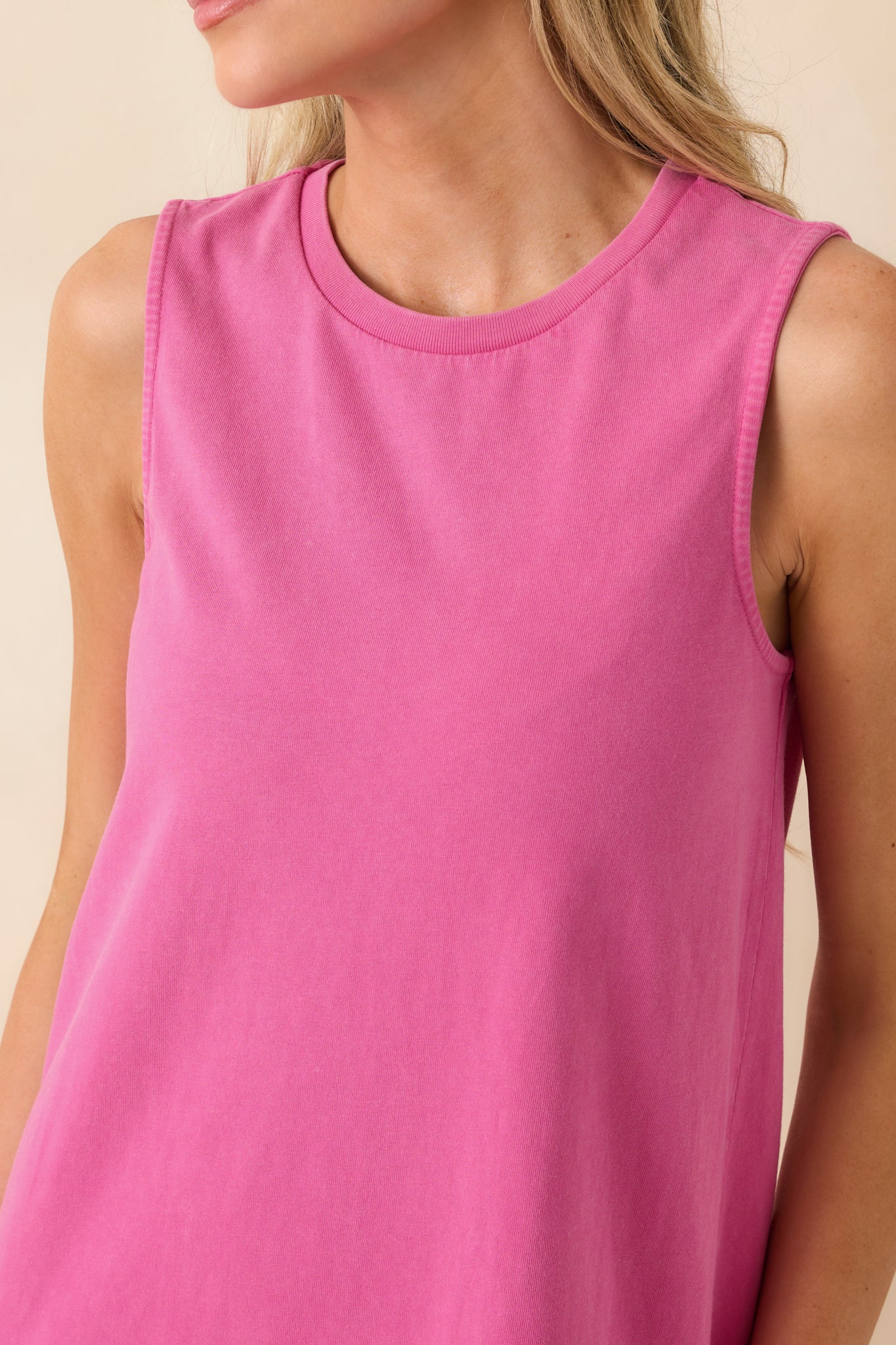 Close-up of the cotton fabric texture and neckline stitching, highlighting the softness and quality of the material.