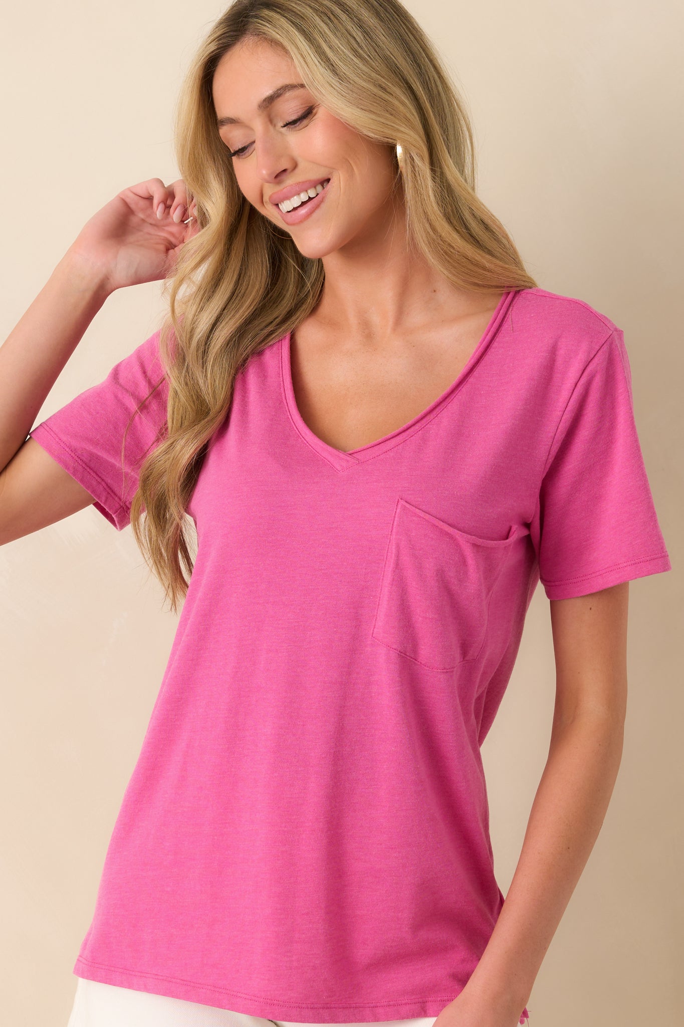 Cropped shot of the sleeve and shoulder seam, highlighting the casual cut and lightweight fabric.