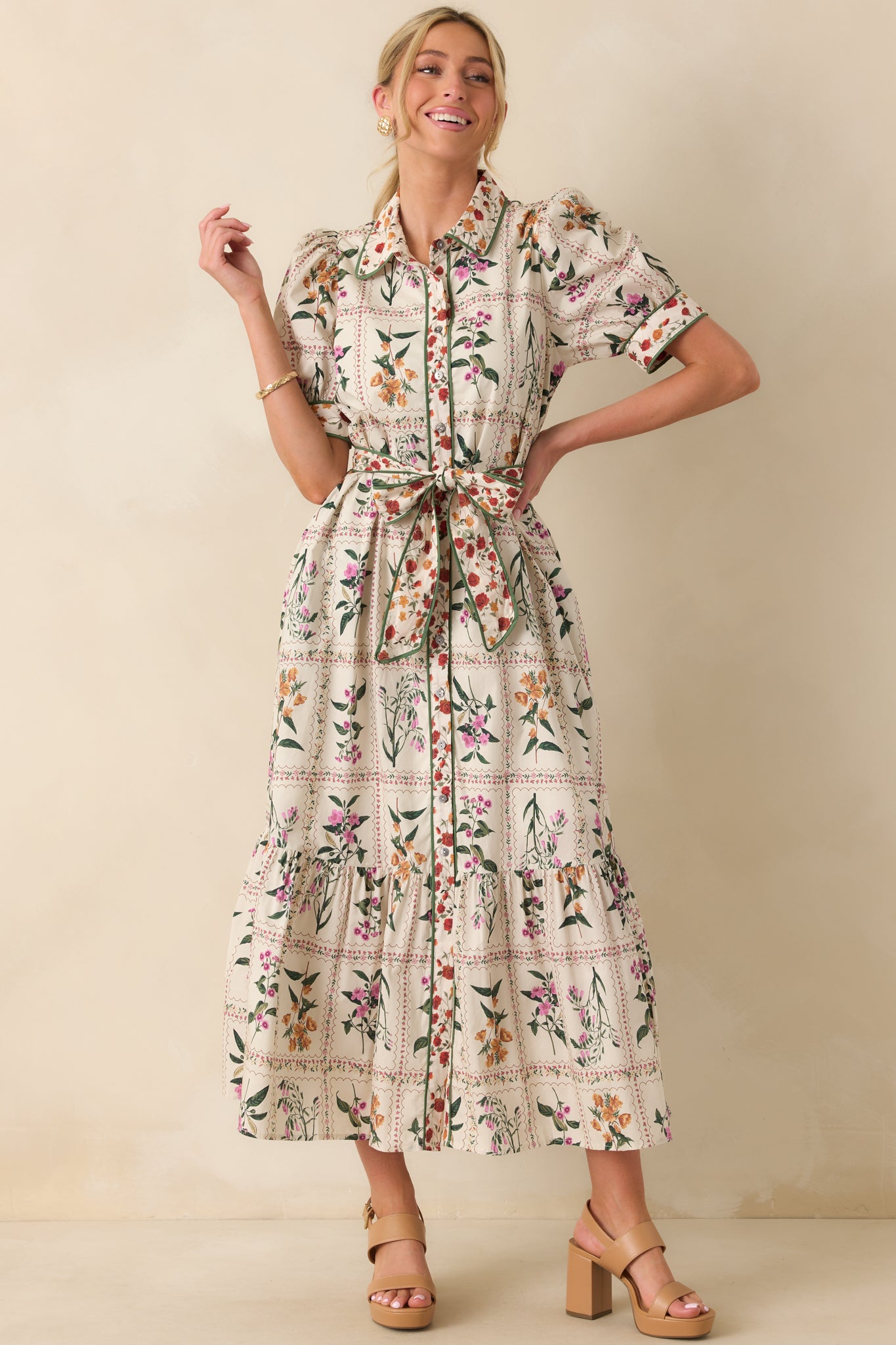Full view of the ivory maxi dress with multicolor patchwork floral print and collared neckline.