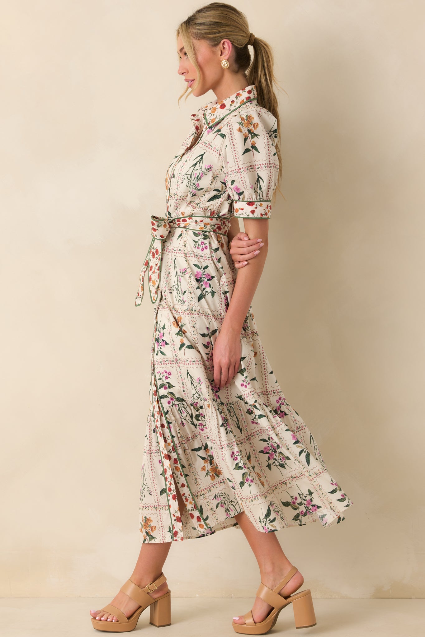 Full length photo emphasizing the flowy silhouette and side pockets.