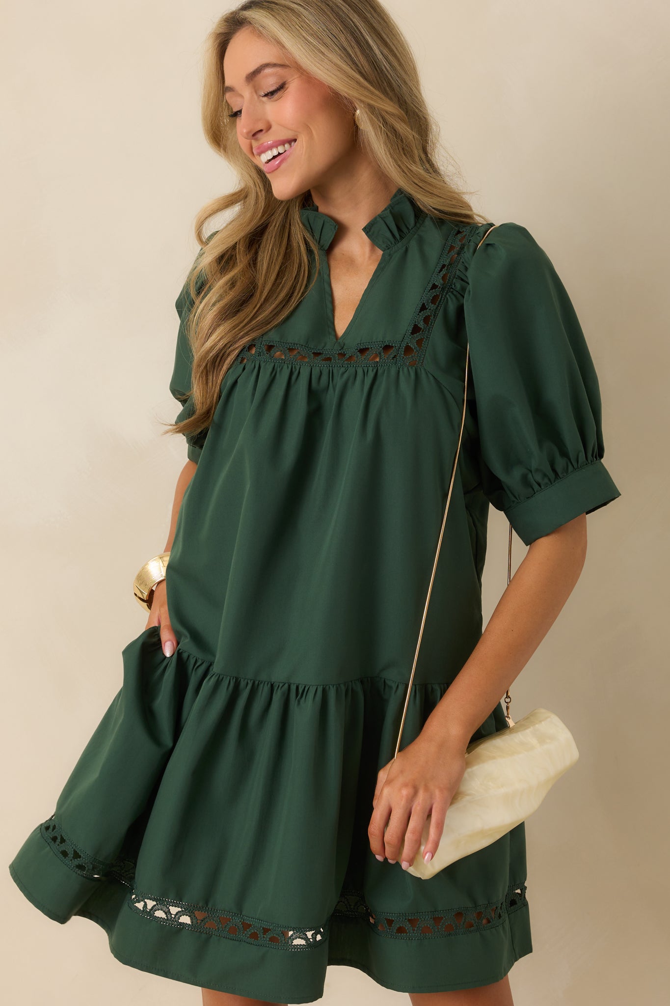 Functional pocket detail blending seamlessly into the mini dress silhouette.