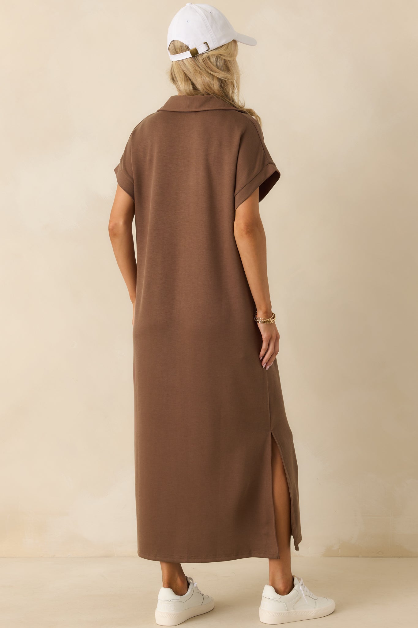 Rear view of the mocha brown midi dress showing the relaxed fit, side vent leg slits, and short sleeves.