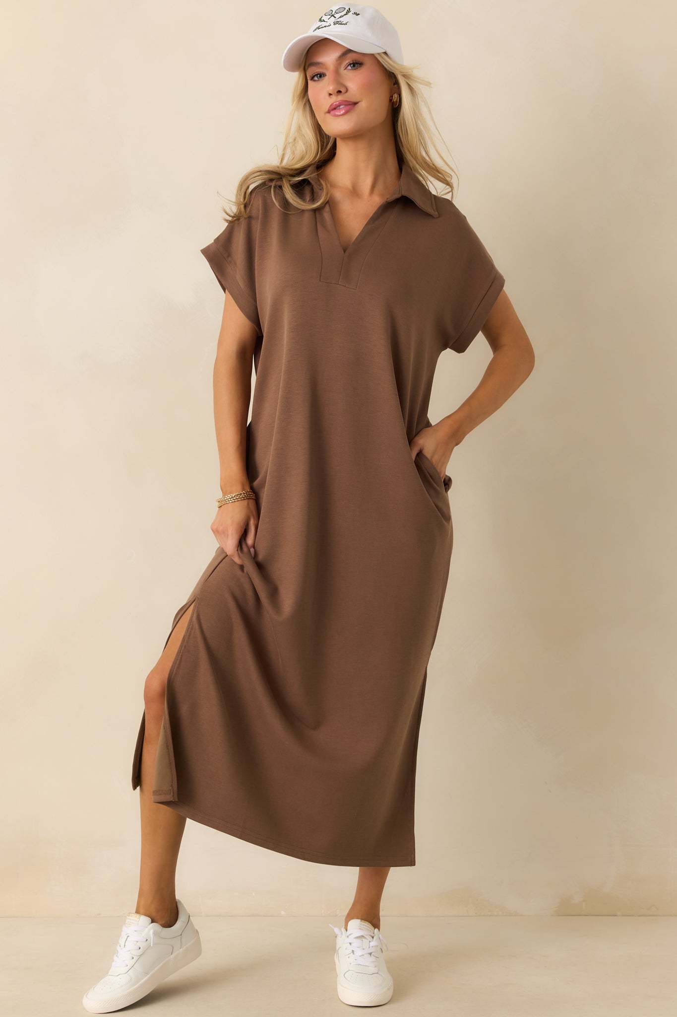 Relaxed-fit mocha brown midi dress with a collared v-neckline, short sleeves, and practical pockets.