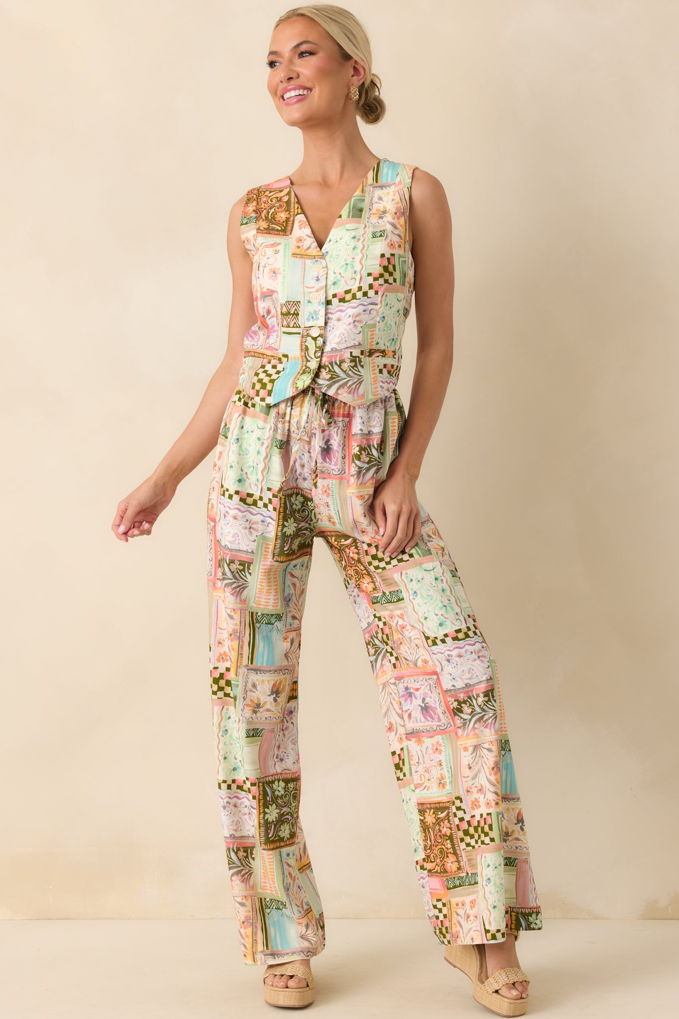 Full body front view of the vest showing the v-neckline, sleeveless cut, and slightly cropped length.