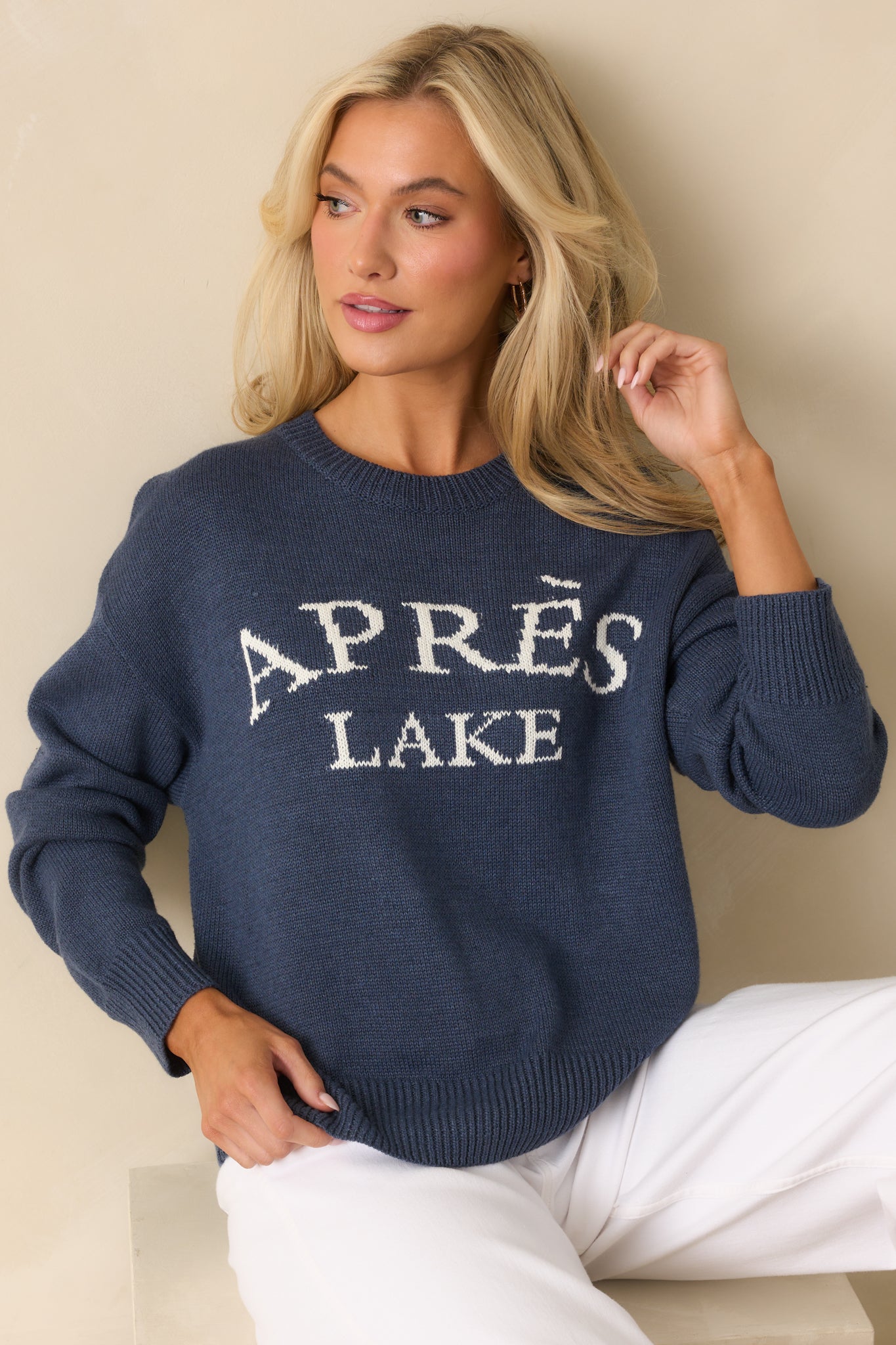 Relaxed-fit navy pullover sweater styled with long sleeves and a crisp crew neckline.