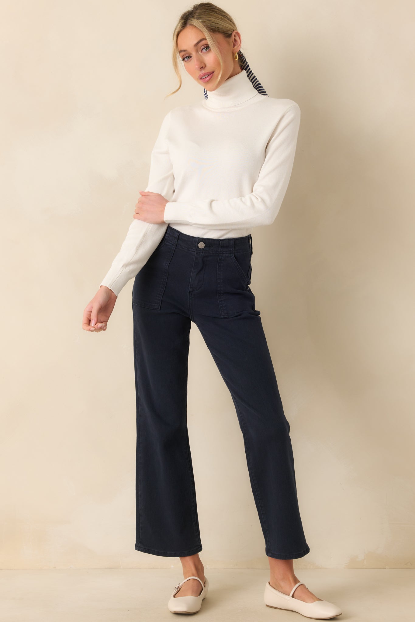 Straight-on full length view of the sweater, emphasizing its cozy silhouette and structured ribbed edges.