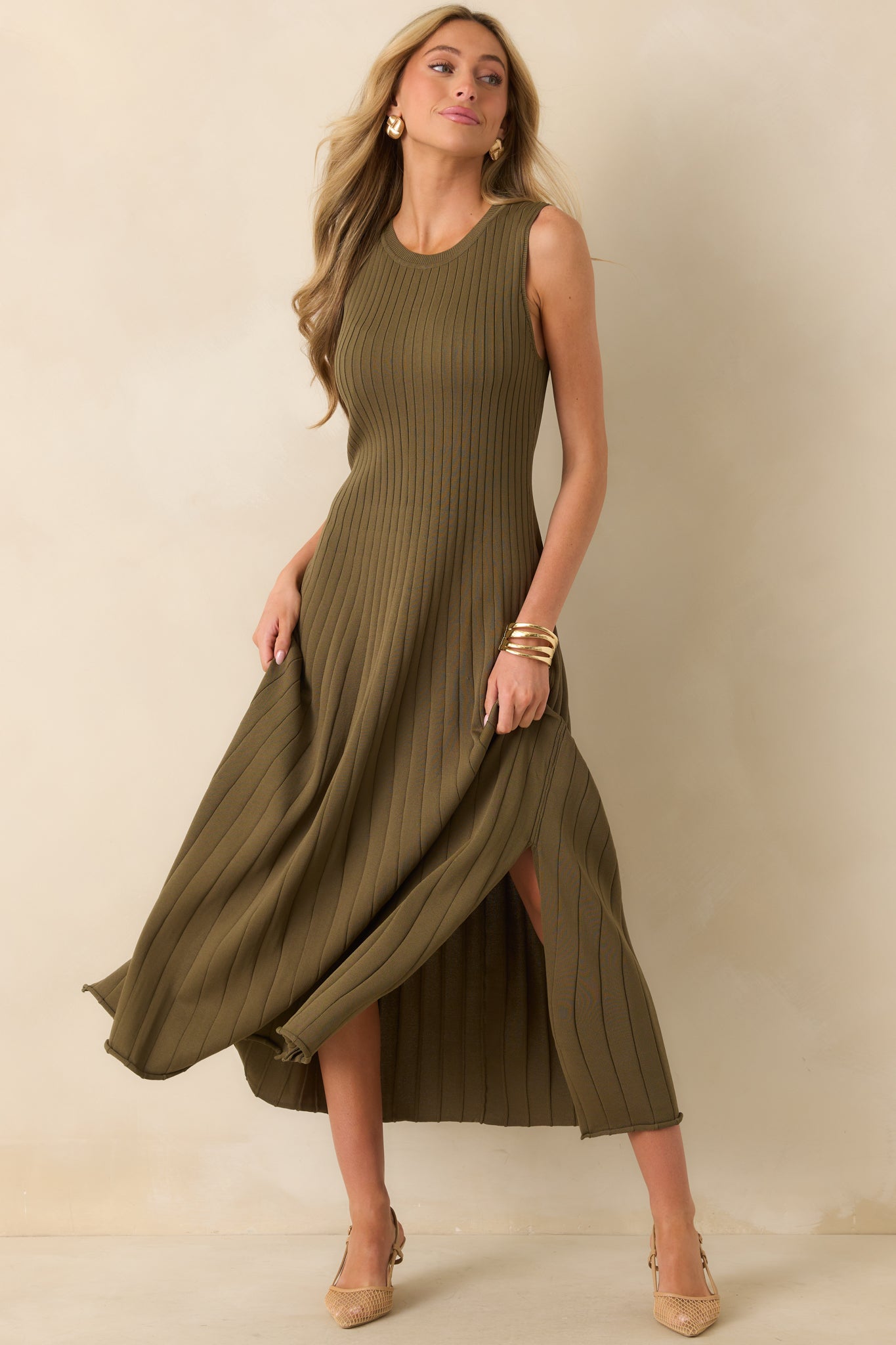 Fitted bodice olive green midi dress with sleeveless design and relaxed skirt
