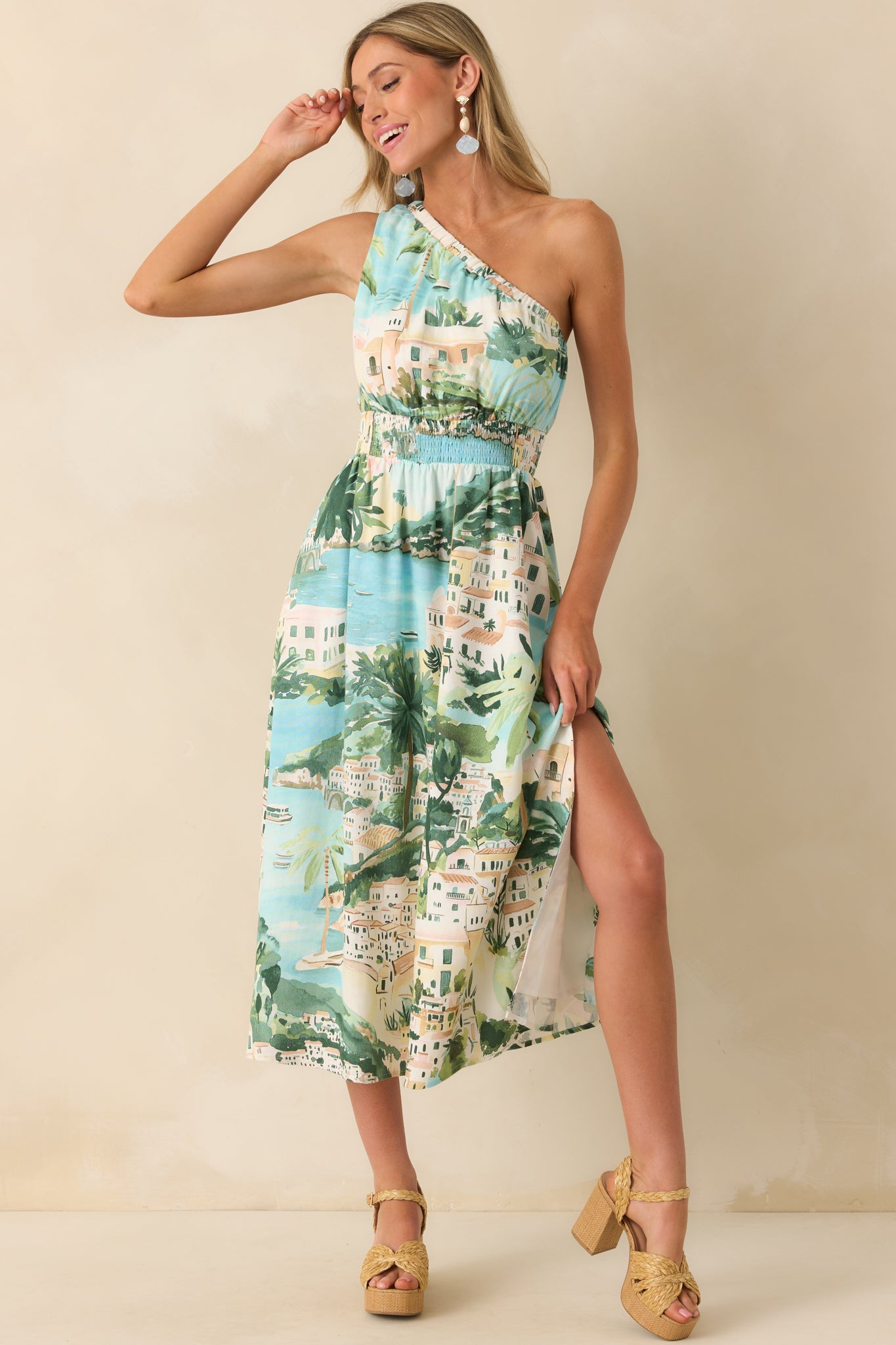 Front view showcasing the asymmetrical neckline and how the shoreline print transitions across the bodice and skirt.