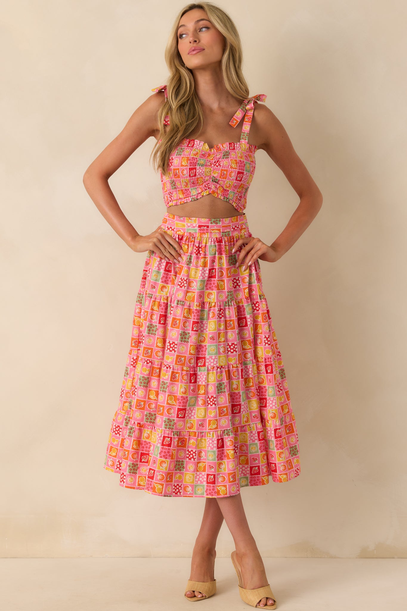 Full length image focusing on the vibrant patchwork print and the skirt’s relaxed, mid-calf length.