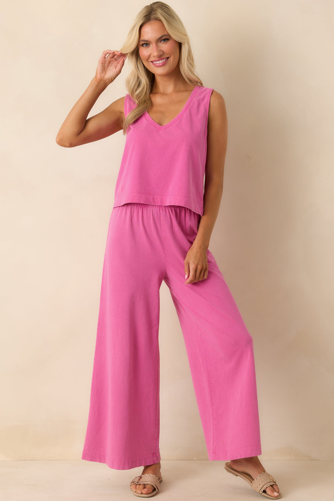 Front-facing full body photo capturing the lightweight fabric and breezy silhouette of the top.