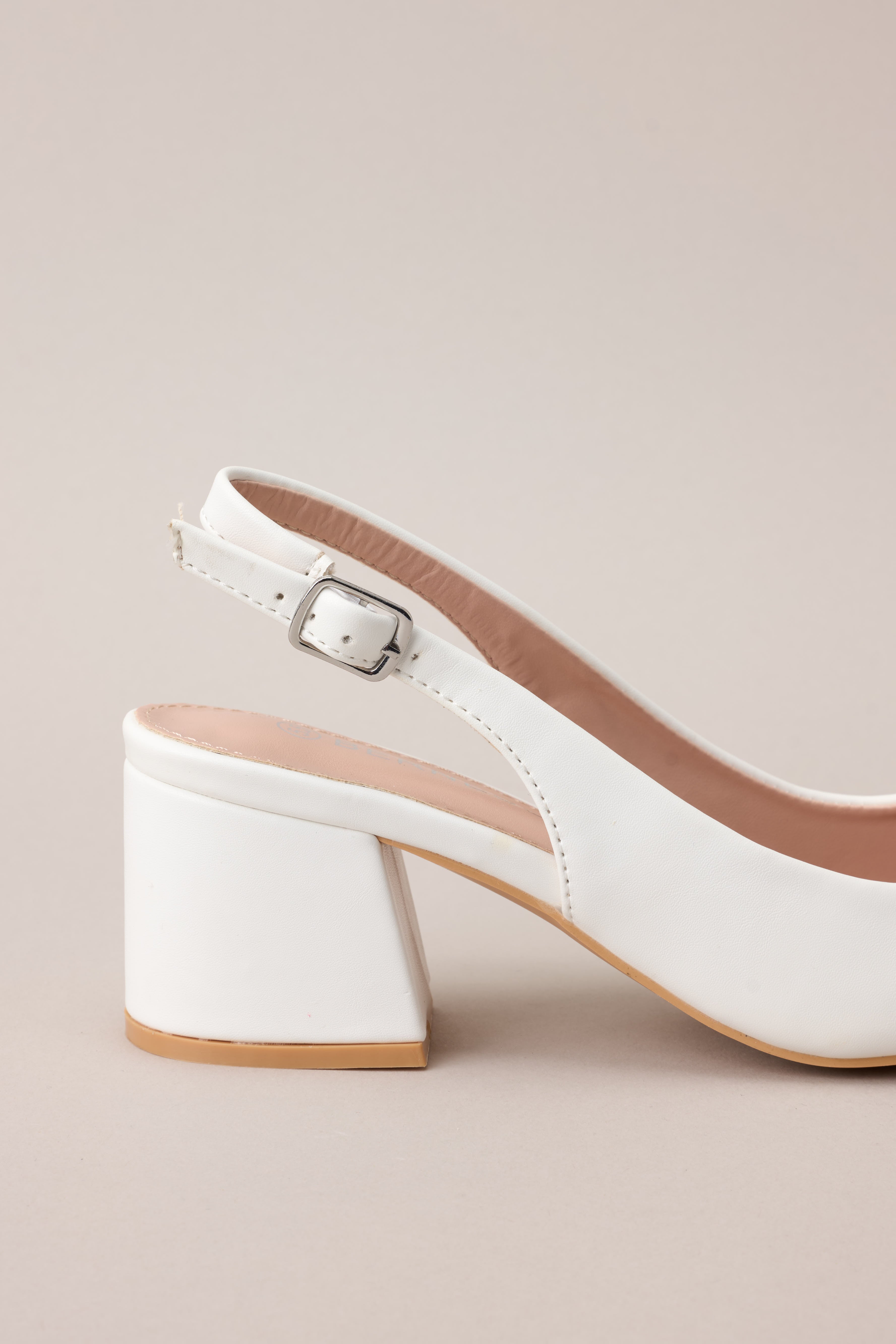A detailed image of the adjustable strap and buckle, showcasing the material and construction.