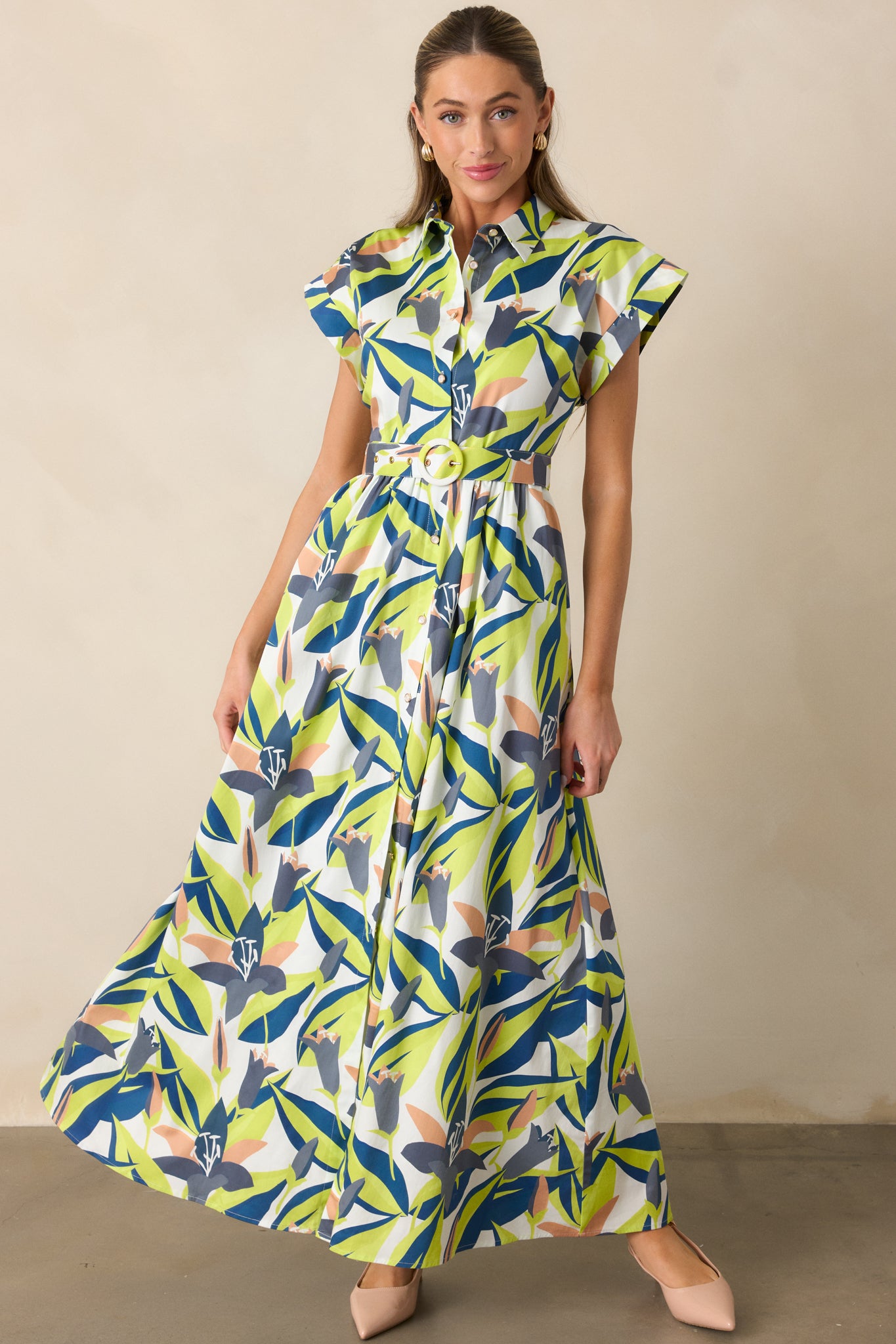 Maxi dress with multicolor floral print, optional belt at waist, and cuffed short sleeves, displayed front facing.