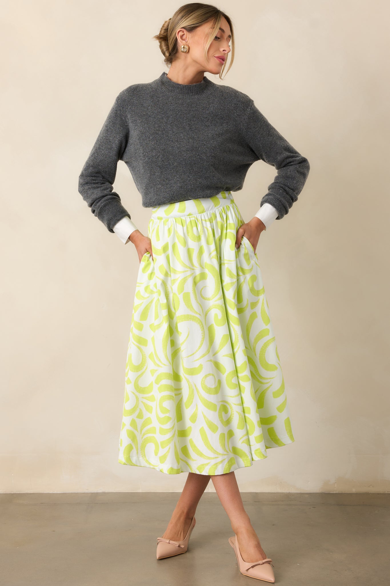 Midi skirt with exclusive brush stroke pattern shown from the front.
