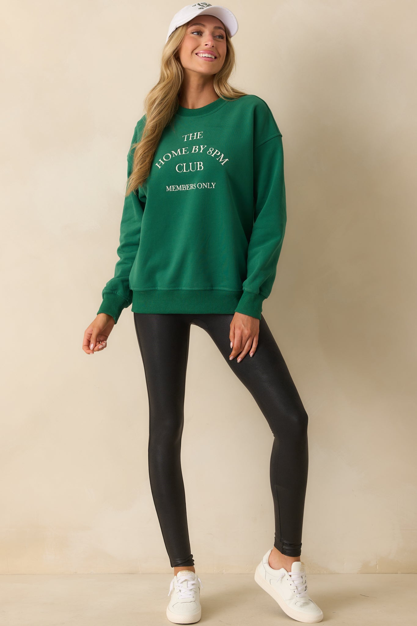 Relaxed-fit forest green sweatshirt with crew neckline and long sleeves for a laid-back look.