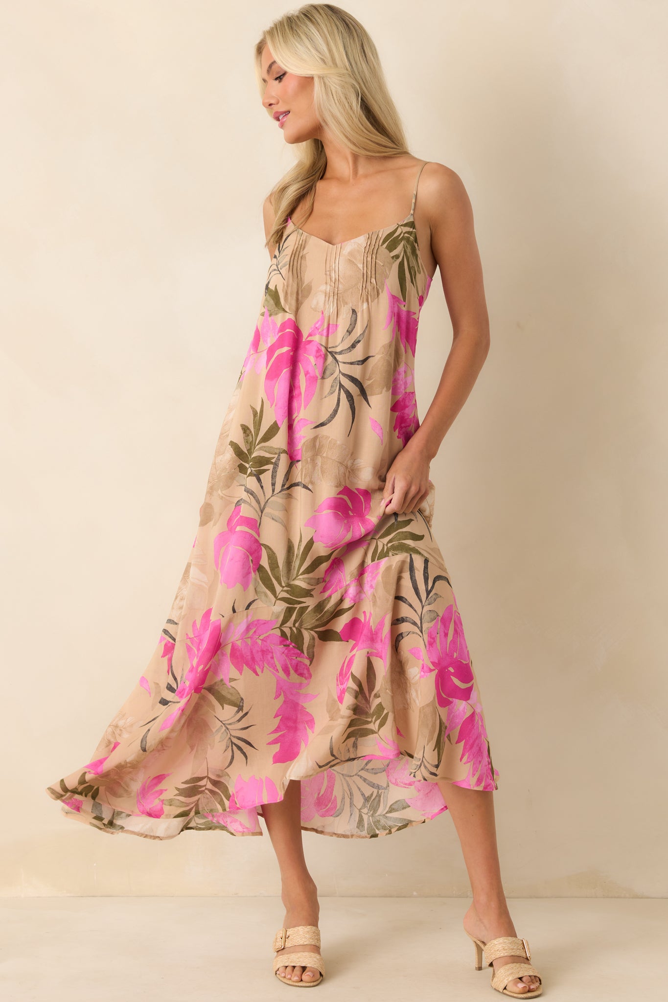 Full body front view of the tan maxi dress showcasing the pink multicolor tropical print and v-neckline.
