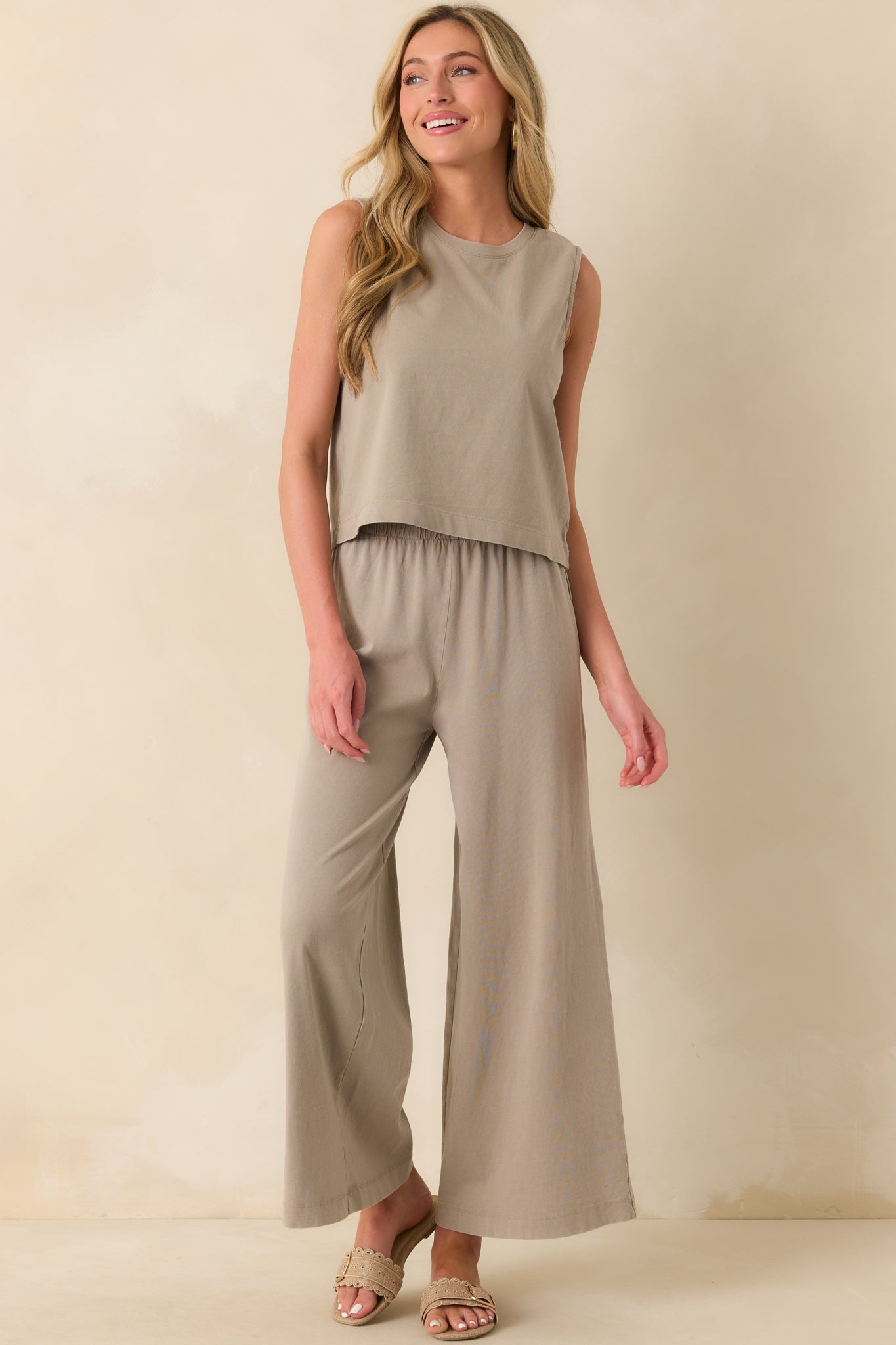 A front-facing full body view showing how the relaxed fit and crew neckline shape the top’s overall look.