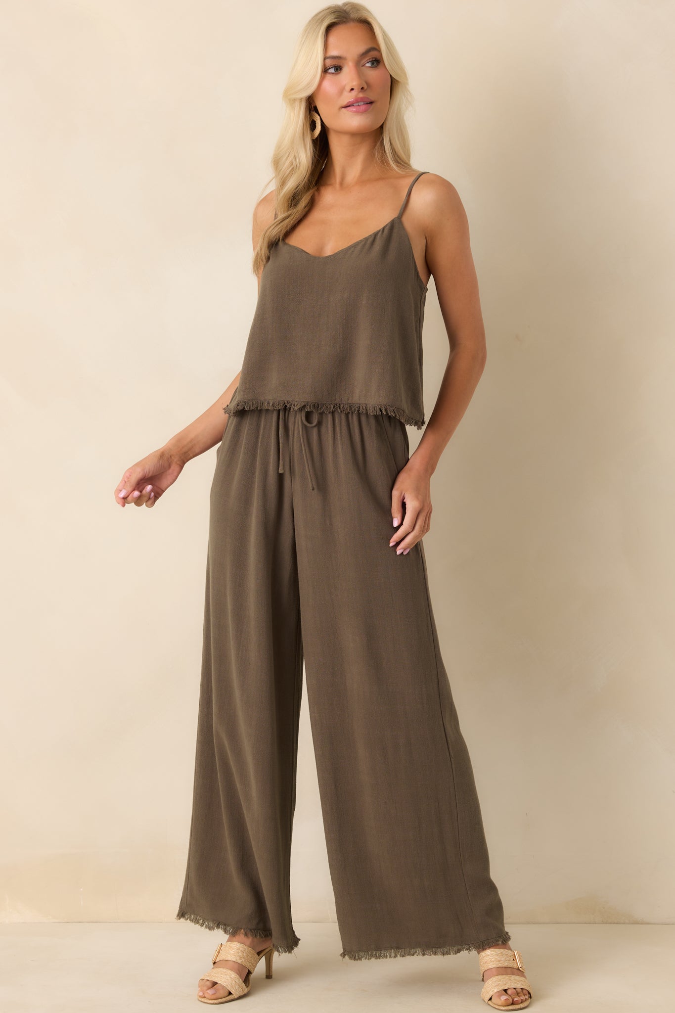 Front-facing full body photo highlighting the adjustable spaghetti straps and slightly cropped length.