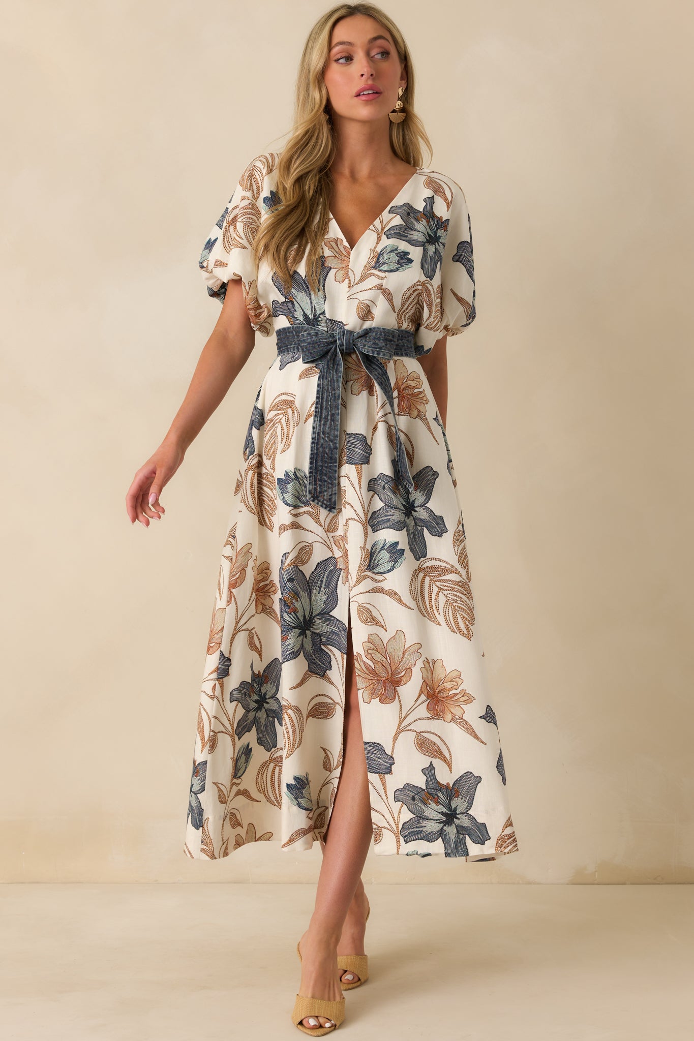 Front-facing full body image highlighting the functional self-tie medium wash belt cinching the waist over the ivory-lined skirt.