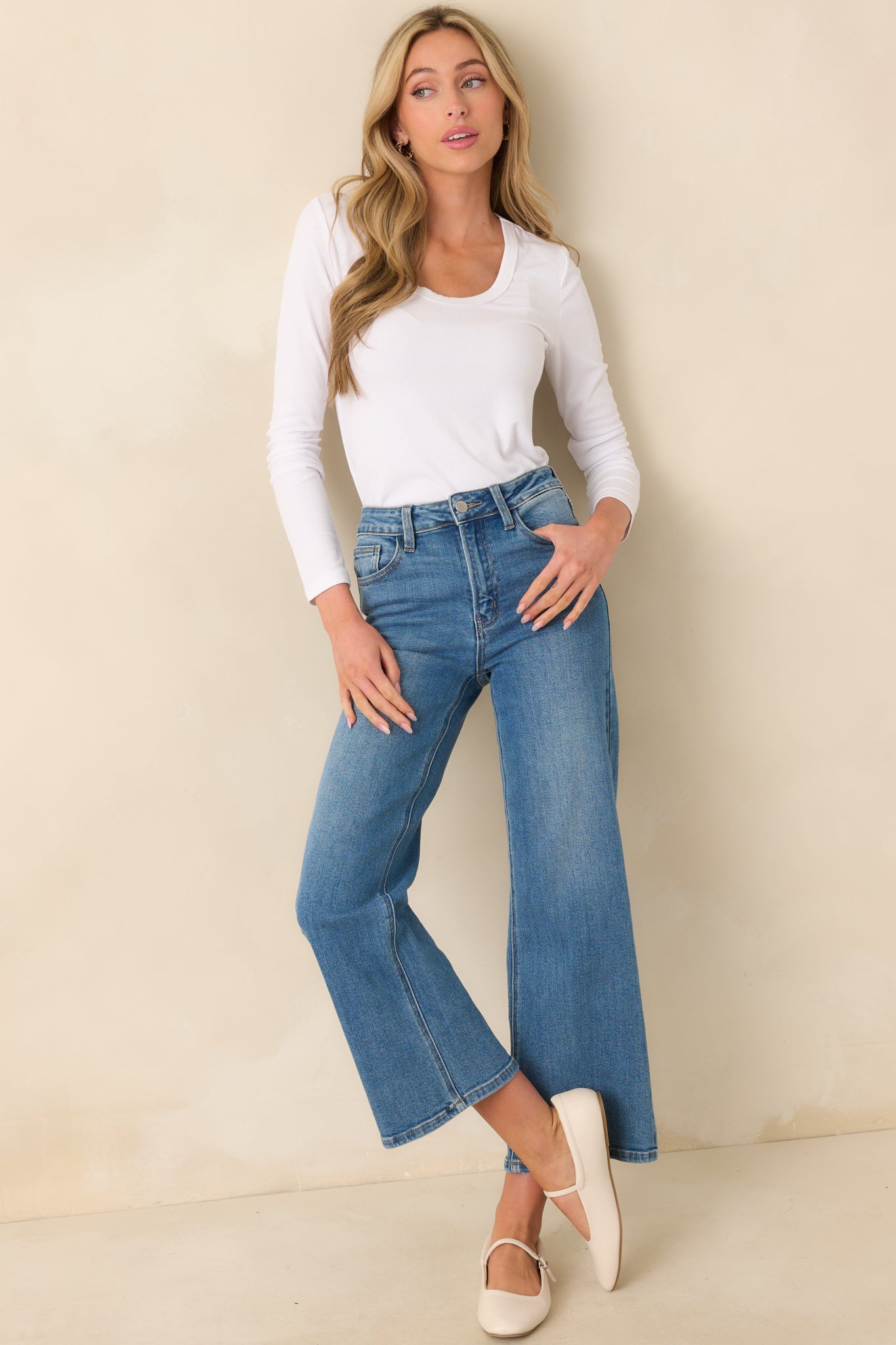 Front view with slight movement, capturing the lightweight look and casual, slightly loose fit of the top.