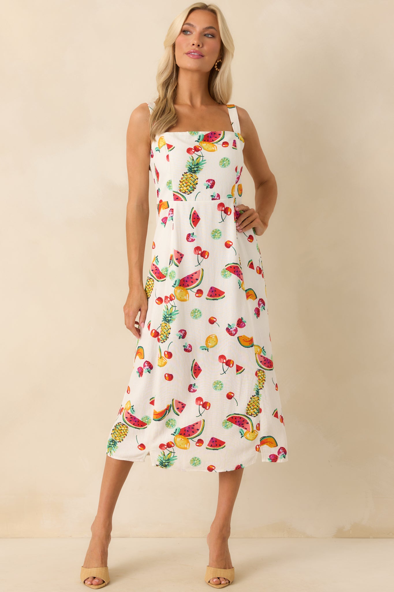 Front-facing full body image highlighting the adjustable shoulder straps and the flowy, full-length silhouette.