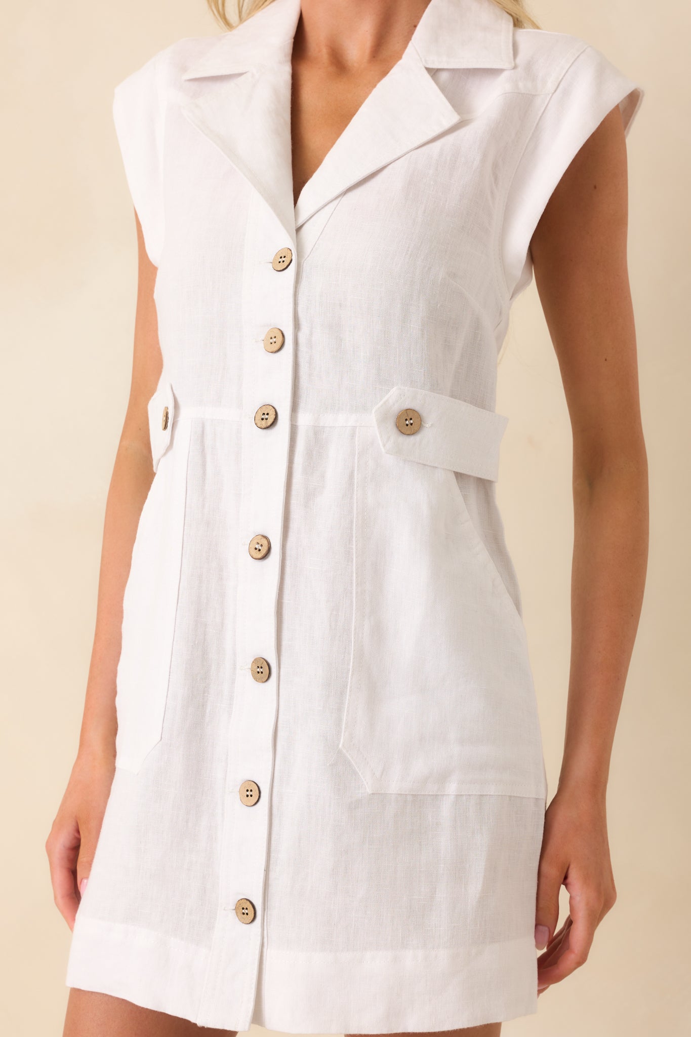 Cropped view of the midsection, capturing how the buttons align along the center front.