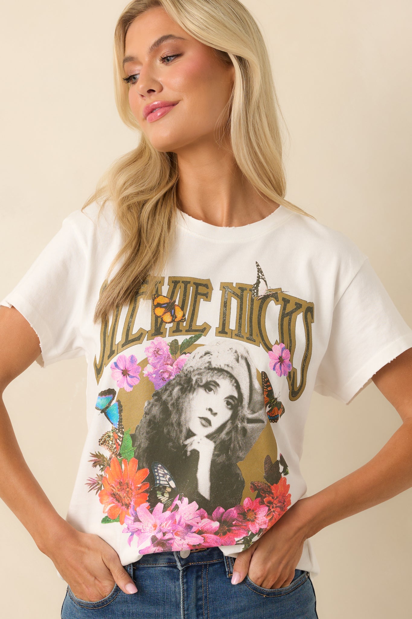 Cropped view of the upper chest showing the Stevie Nicks portrait and metallic floral frame.
