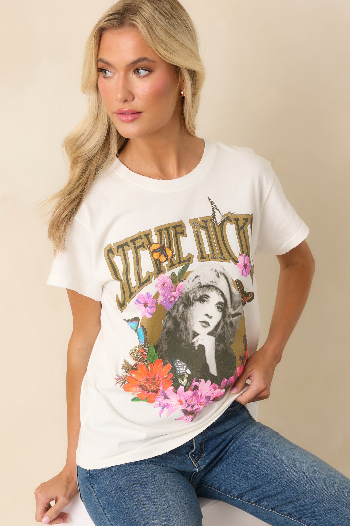 Cropped image centered on the graphic print to highlight the metallic ink accents and color contrast.