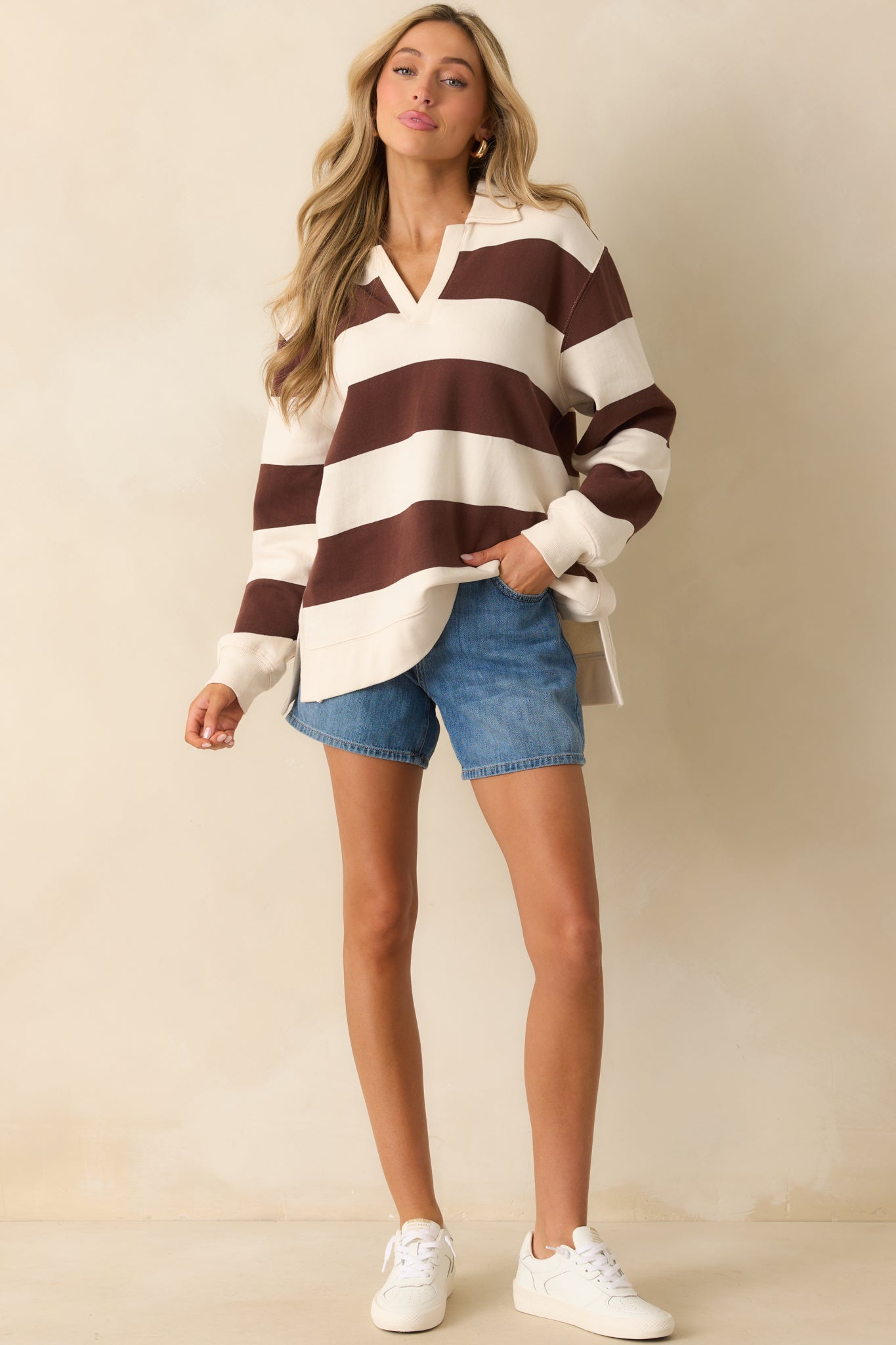 Front angle emphasizing the pullover’s casual silhouette and stripe alignment.