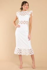 Full body view of this crochet lace midi dress that features a peek-a-boo waistline which gives way into a sheath silhouette fit.