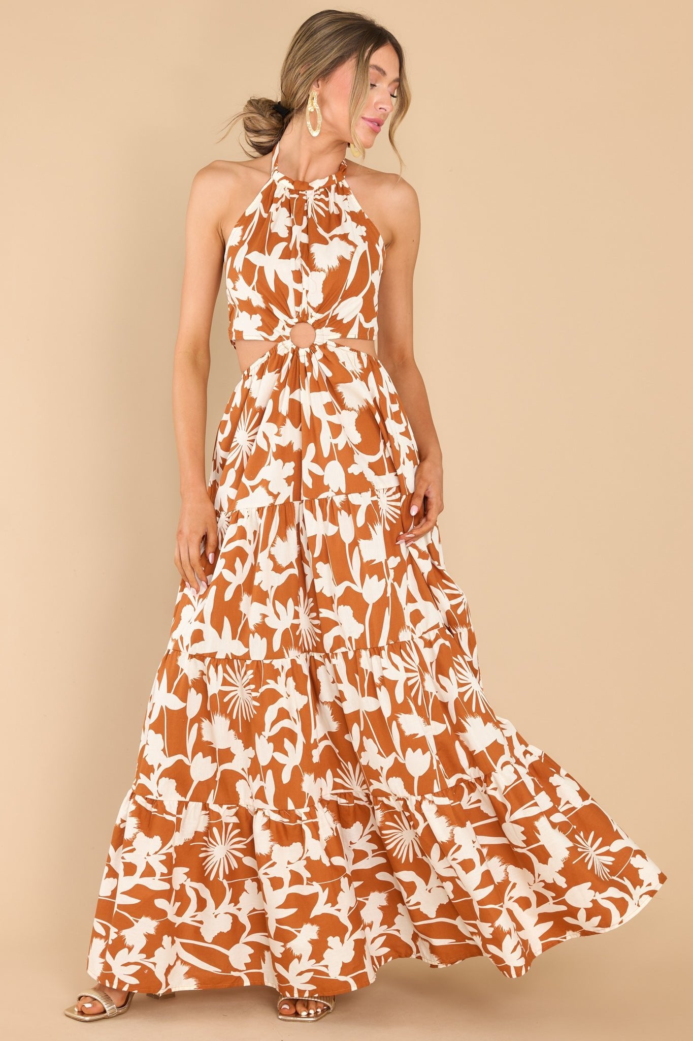 Full body view of this dress that features the flow of the skirt.