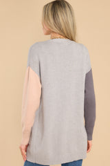 Back view of this cardigan that features a color-blocked design.