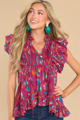 Front view of this top that showcases the colorful pattern of the fabric.