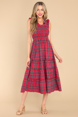 Full body view of this dress that showcases a plaid pattern in shades of red and blue.