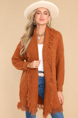 Front view of this cardigan that features long sleeves with ribbed cuffs.