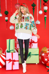 Full body view of this sweatshirt that features an all-over festive sequin pattern.