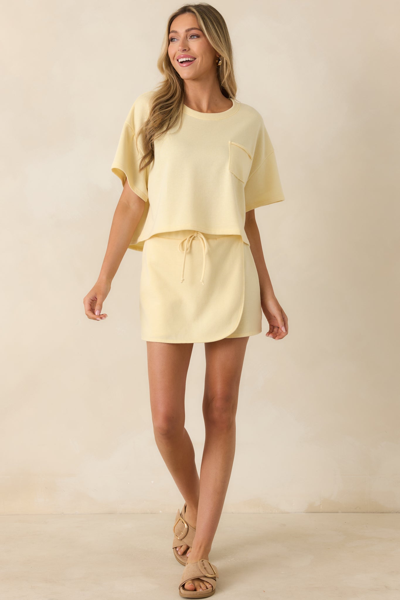 Soft jersey knit cropped tee in banana yellow showcasing a relaxed shape and breathable cotton-poly blend feel.