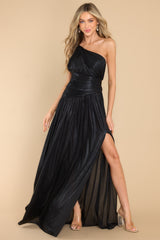 Front view of this dress that features an asymmetrical neckline with a braided strap, a slit in the chest, a side zipper, and a front slit.