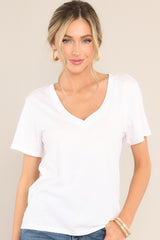 Full front view of this top that features a v-neckline, short sleeves, and a lightweight fabric.