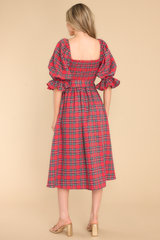 back of red plaid midi dress with a smocked bust and puffed sleeves.