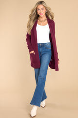Full body view of this cardigan that features front pockets, an oversized cozy fit, and soft knit fabric.
