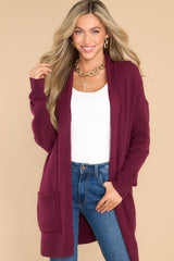 Front view of this cardigan that features an oversized cozy fit and soft knit fabric.