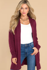 Front view of this cardigan that features front pockets, an oversized cozy fit, and soft knit fabric.