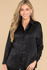 Front view of this top that features a satin-like material.