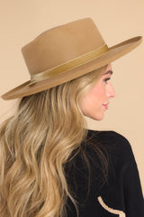 Side view of this hat that has a vintage-inspired men's silhouette, a rigid diamond crown with a flicked edge, a caramel velvet with sewn black detail ribbon trim, brim measurement of 10cm, and is accredited a UPF rating of 50+.