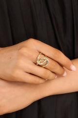 Front view of this ring that features a gold double loop design.
