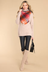 Full body view of this sweater that features a cowl turtle neckline and long sleeves with ribbed cuffs.