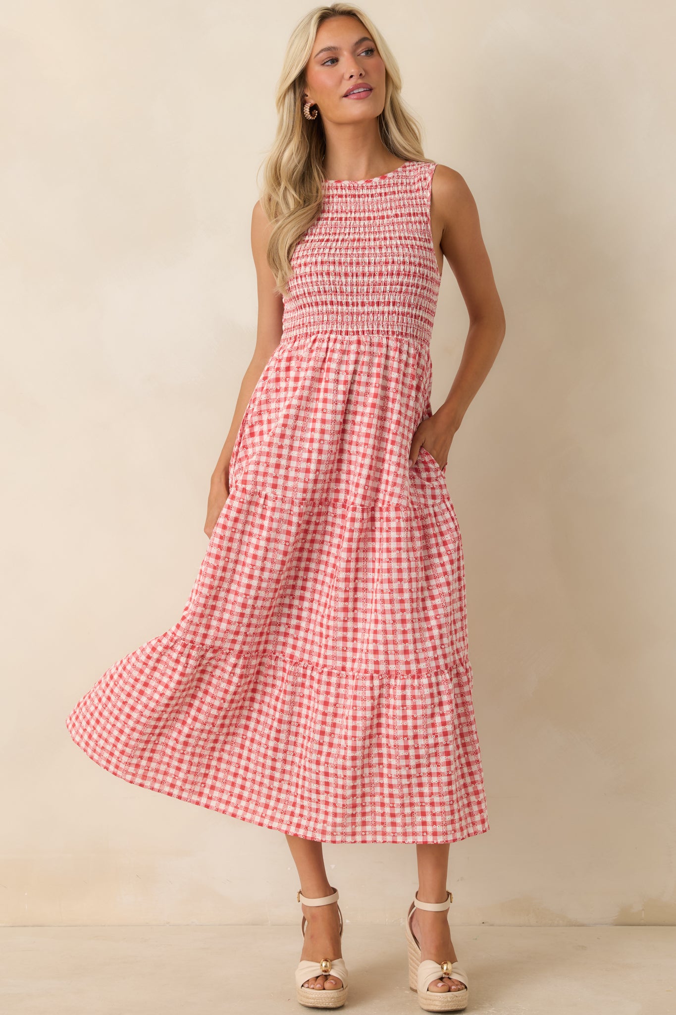 Cotton midi dress with eyelet embroidery throughout and a breathable, lightweight feel.