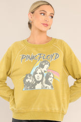 Front view of  this sweatshirt that features a ribbed crew neckline, exposed seams, graphic of the band members, 