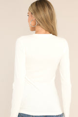 Back view of this top that features a crew neckline, a ribbed texture, and long sleeves.